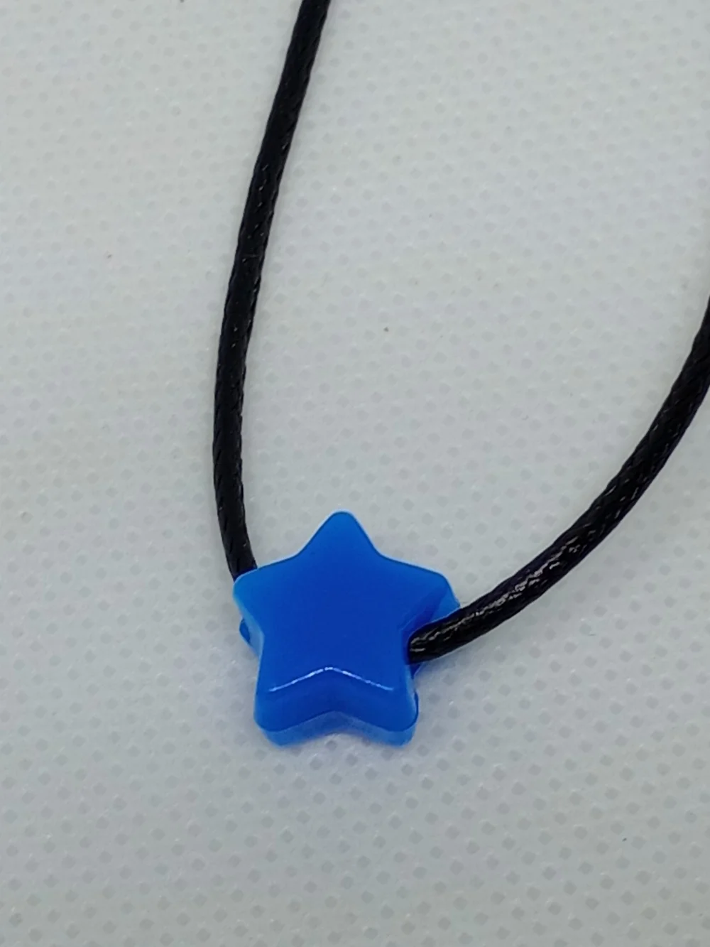 Blue Star Pendant Necklace on Black Cord